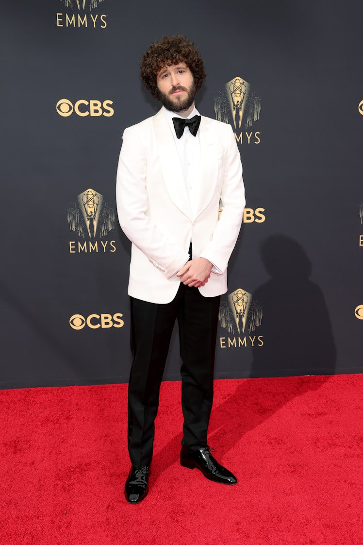 Dave Burd in a white shirt, white blazer, a black bow tie and black trouser at the Emmys Red Carpet ...