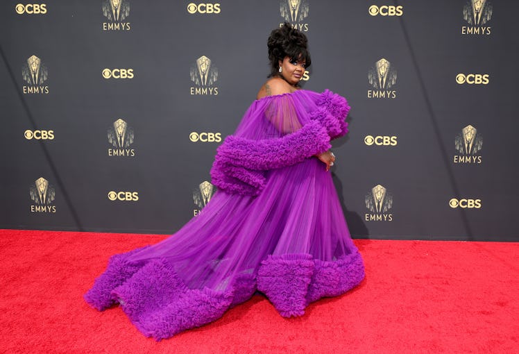 Nicole Byer in a purple frilled tulle dress at the Emmys Red Carpet 2021