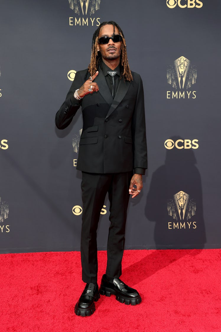 GaTa in a black suit and a black shirt at the Emmys Red Carpet 2021