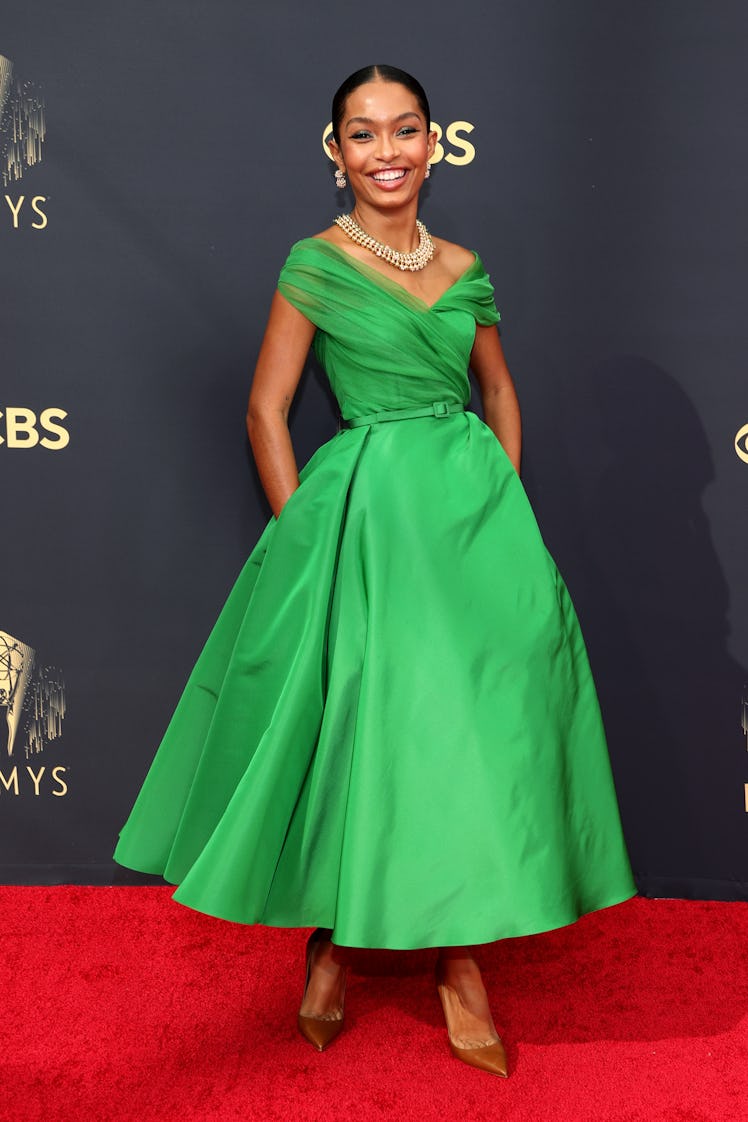 Yara Shahidi in a green dress at the Emmys Red Carpet 2021