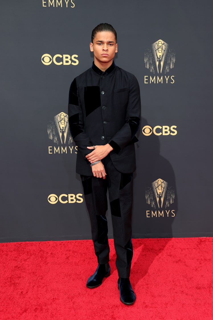 D'Pharaoh Woon-A-Tai in a black suit at the Emmys Red Carpet 2021