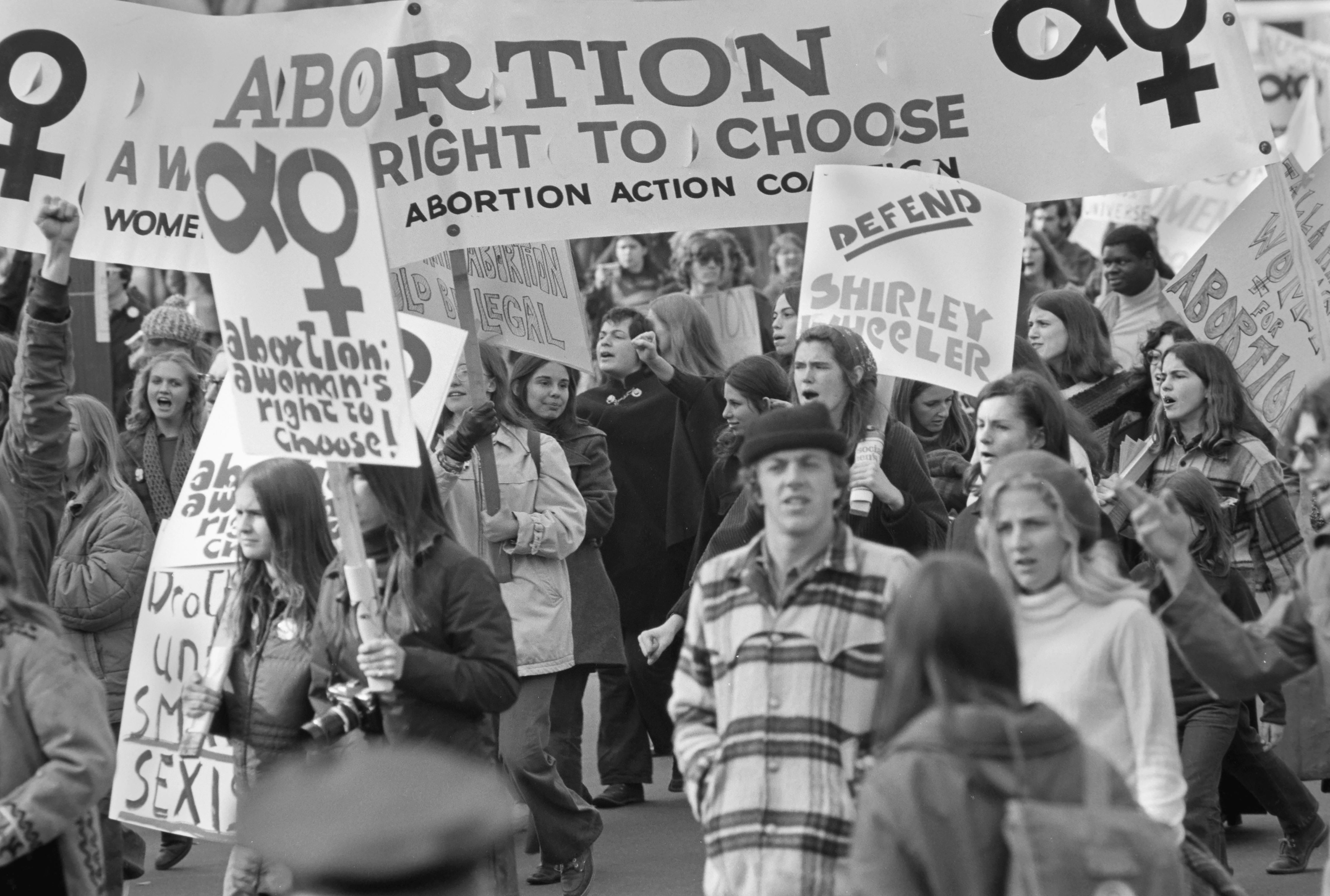View of pro-Choice demonstrators, may with signs, as they march on Pennsylvania Avenue, Washington D...