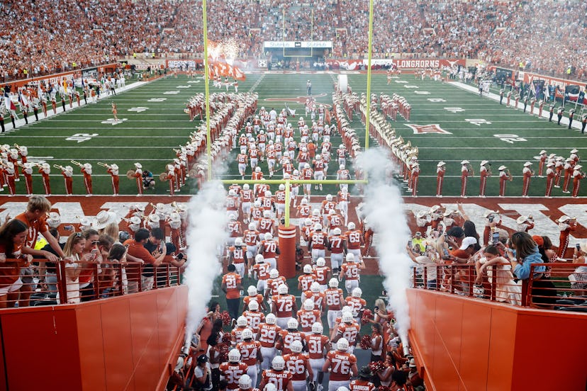 Texas Longhorns take the field before the game against the Rice Owls at Darrell K Royal-Texas Memori...