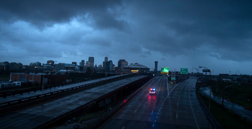 NEW ORLEANS LA - AUGUST 30 The downtown skyline  is largely shrouded in darkness during the dawn as ...