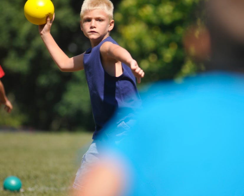 Michael R. Lee, 7, of Lower Heidelberg Township, plays dodgeball during a county playground event Fr...