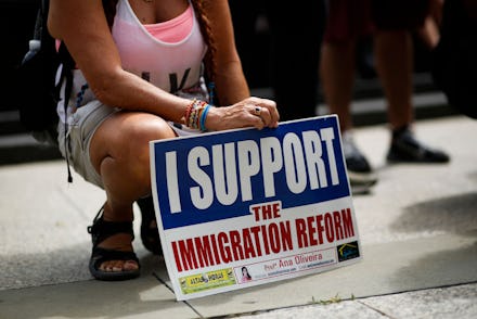 People attend a protest supporting DACA, Deferred Action for Childhood Arrivals, at Foley Square in ...