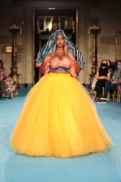 Precious Lee is the plus-size model taking Fashion Week by storm. See her best runway appearances, h...