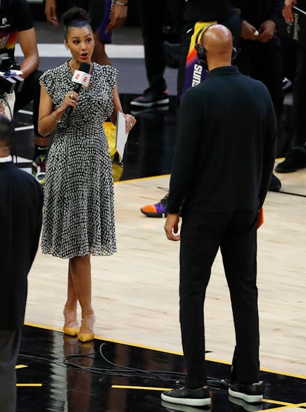 PHOENIX, ARIZONA - JULY 06: Reporter Malika Andrews from ESPN talks with Monty Williams of the Phoen...