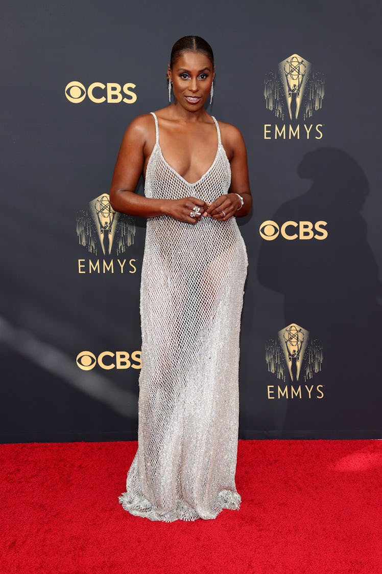 Issa Rae in a mesh white sequin dress at the Emmys Red Carpet 2021