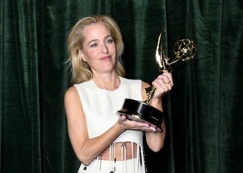 'The Crown' star Gillian Anderson poses with her Emmy award for 'Outstanding Supporting Actress for ...