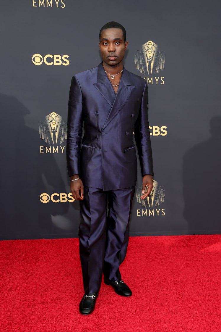 Paapa Esseidu in a navy satin suit at the Emmys Red Carpet 2021