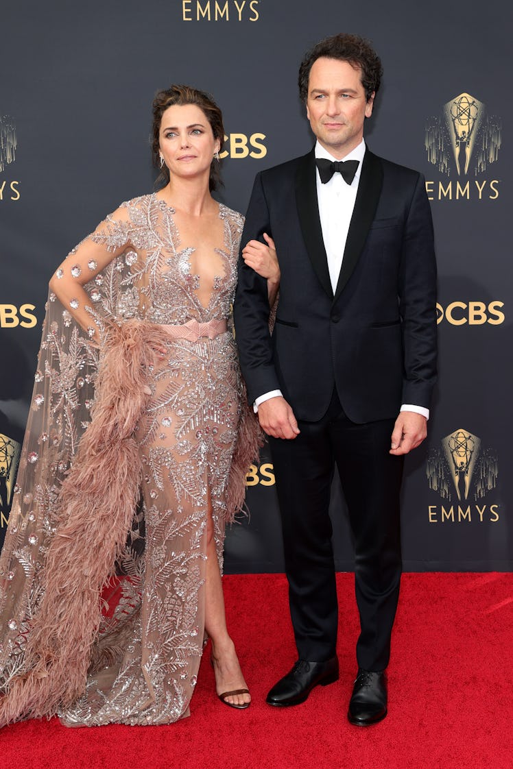 Kerri Russel in a beige-silver tulle dress and Matthew Rhys in a black suit and white shirt at the E...