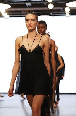LONDON, ENGLAND - SEPTEMBER 17:  Models walk the runway at the Nensi Dojaka show during London Fashi...