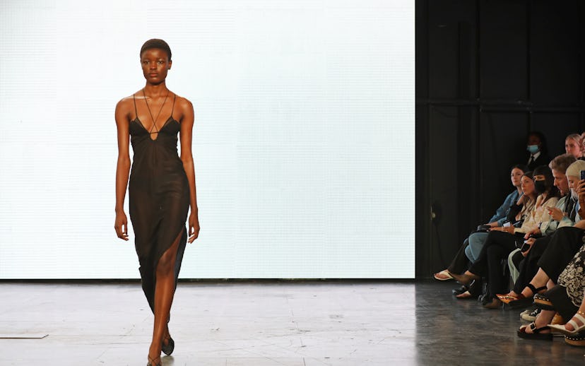 LONDON, ENGLAND - SEPTEMBER 17: A model walks the runway at the Nensi Dojaka show during London Fash...