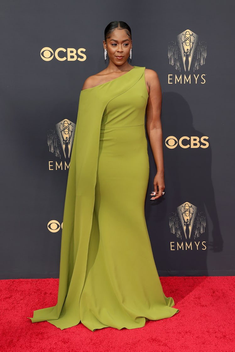Moses Ingram in an olive dress at the Emmys Red Carpet 2021