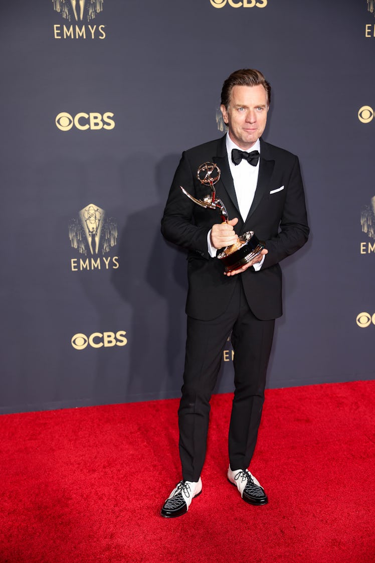 Ewan McGregor in a black suit, a white shirt and a black bow tie at the Emmys Red Carpet 2021