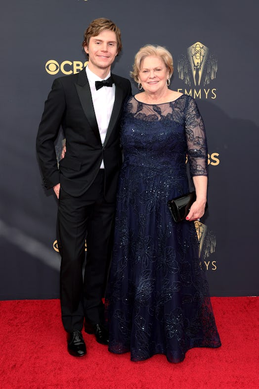 Evan Peters attend the 73rd Primetime Emmy Awards with his mother