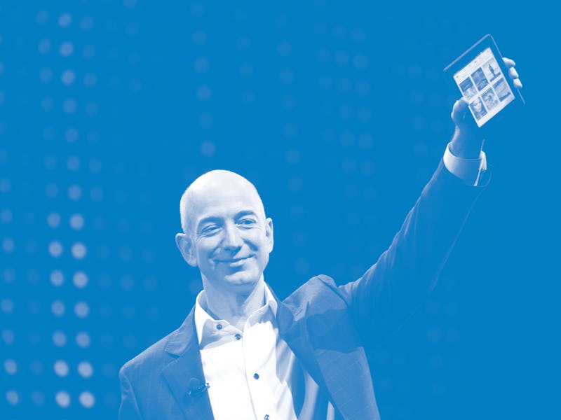 SANTA MONICA, CA - SEPTEMBER 6: Amazon CEO Jeff Bezos holds a new front-lit Kindle Paperwhite 3G re...