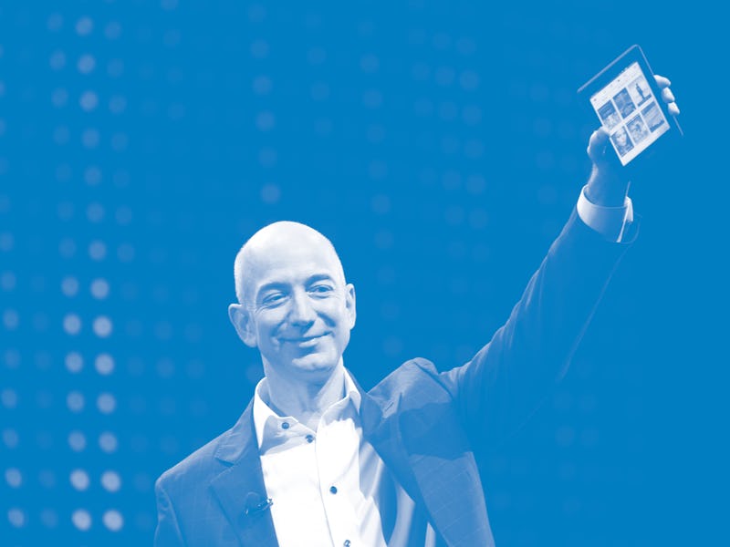 SANTA MONICA, CA - SEPTEMBER 6:  Amazon CEO Jeff Bezos holds a new front-lit Kindle Paperwhite 3G re...