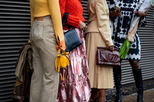 LONDON, ENGLAND - SEPTEMBER 19: Guests seen wearing bags outside Rejina Pyo during London Fashion We...