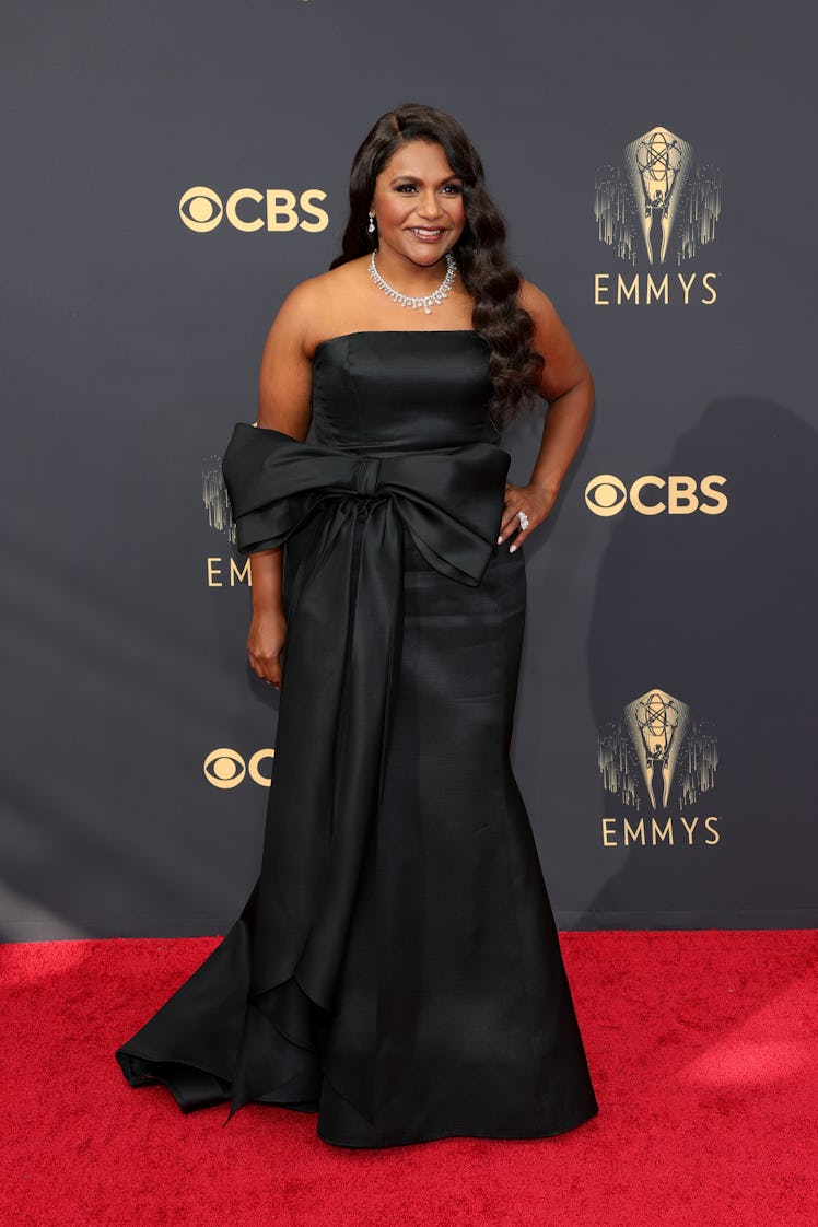 Mindy Kaling in a black satin dress at the Emmys Red Carpet 2021