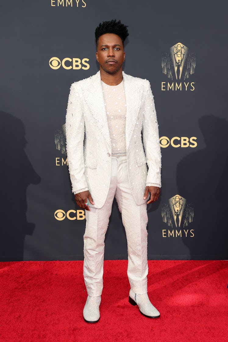Leslie Odom Jr. in a white sequin suit and shirt at the Emmys Red Carpet 2021