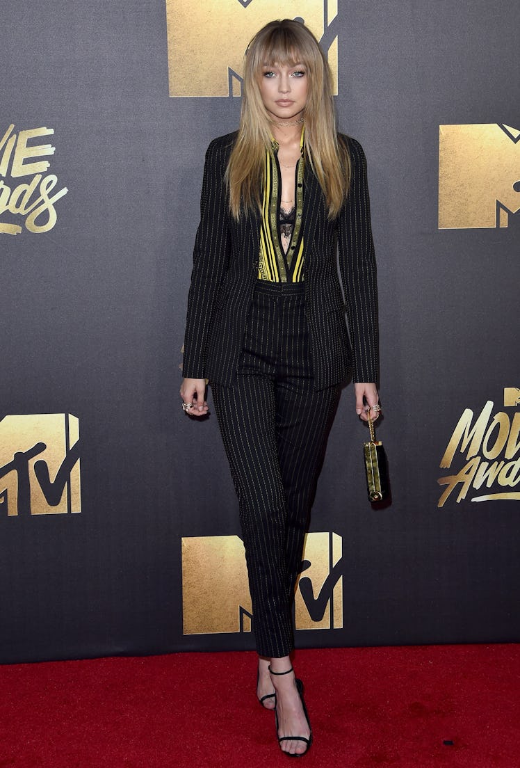 BURBANK, CA - APRIL 09:  Model Gigi Hadid arrives at the 2016 MTV Movie Awards at Warner Bros. Studi...