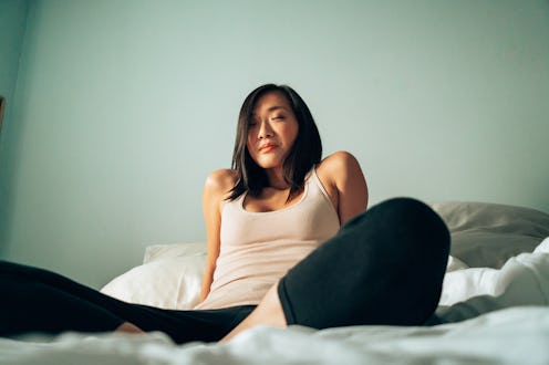 young chinese woman resting at home