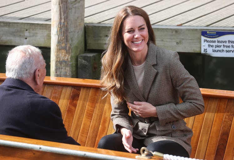 LOW WRAY, ENGLAND - SEPTEMBER 21: Catherine, Duchess of Cambridge reacts as the boats horn sounds ah...