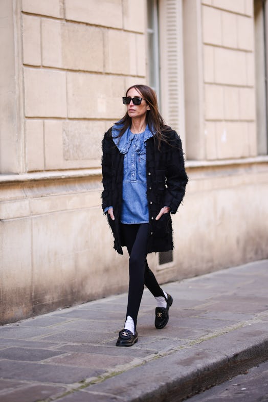 Stirrup leggings with an oversize shirt, loafers, and socks.  