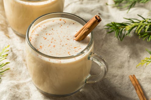 A cup of eggnog dusted with cinnamon and spiked with alcohol. These are the best types of alcohol to...