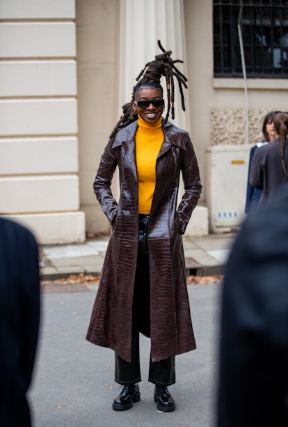 LONDON, ENGLAND - SEPTEMBER 20: British rapper Little Simz is seen wearing brown coat outside Fashio...