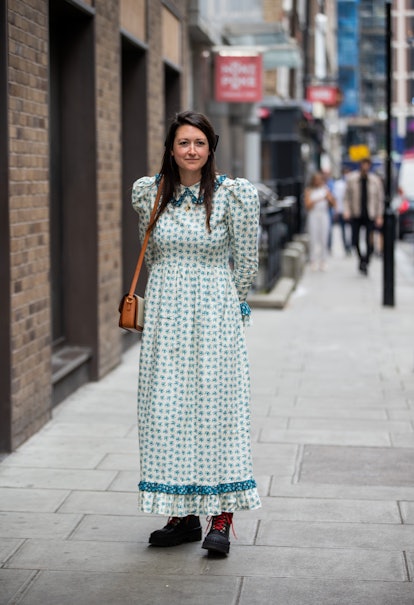 LONDON, ENGLAND - SEPTEMBER 19: A guest is seen wearing dress with print outside Roland Mouret durin...