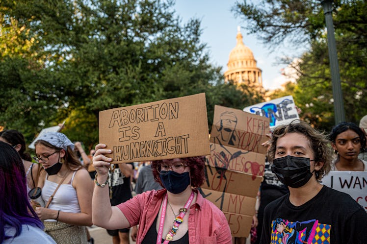 AUSTIN, TX - SEPT 1: Pro-choice protesters march outside the Texas State Capitol on Wednesday, Sept....