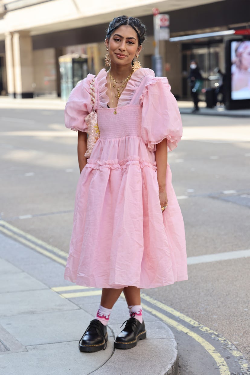 LONDON, ENGLAND - SEPTEMBER 18: Guest wearing pink dress attends yuhan wang at TIKTOK show space dur...