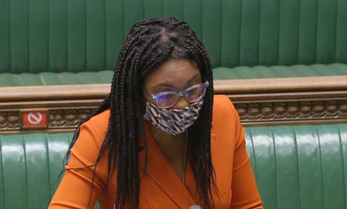 Equalities Minister Kemi Badenoch answers a question at the despatch box while wearing a face coveri...