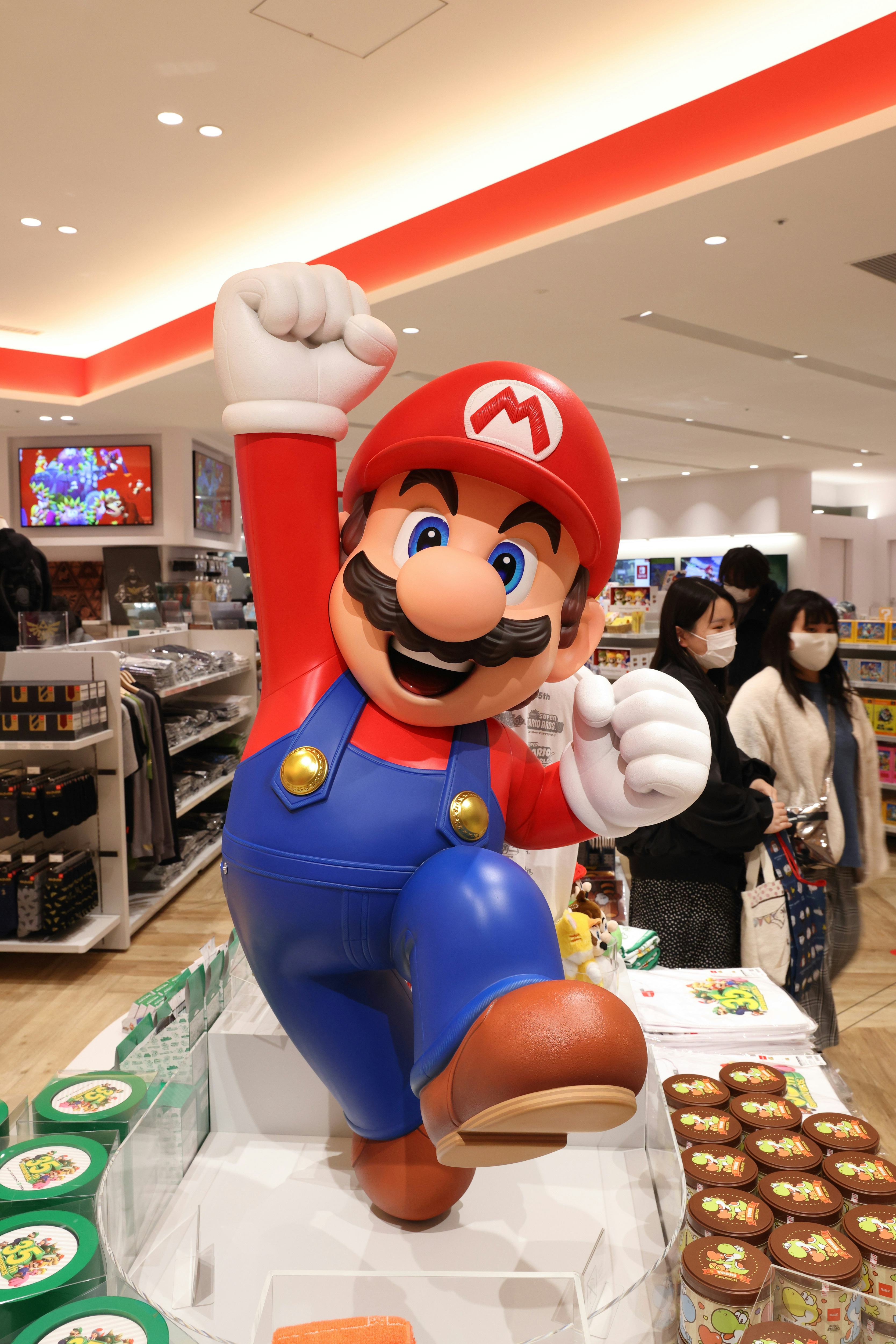 TOKYO, JAPAN - 2021/03/03: Super Mario figurine inside Nintendo Tokyo store in Shibuya. (Photo by St...