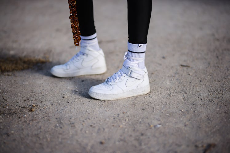 PARIS, FRANCE - APRIL 06: Emy Venturini @sustainably_by_emy wears black sportswear leggings from Ame...
