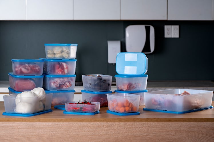 A high-quality image of plastics containers with fresh foods and vegetables for healthy concept