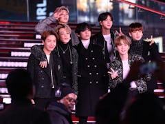 NEW YORK, NEW YORK - DECEMBER 31: BTS performs during Dick Clark's New Year's Rockin' Eve With Ryan ...
