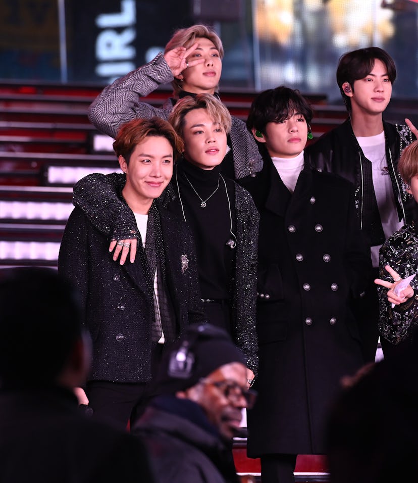 NEW YORK, NEW YORK - DECEMBER 31: BTS performs during Dick Clark's New Year's Rockin' Eve With Ryan ...