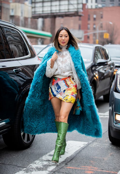 Aimee Song wearing boots outside Zimmermann during New York Fashion Week Fall / Winter in New York C...