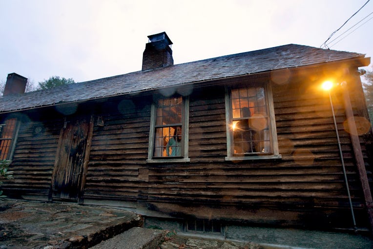 HARRISVILLE, RI - OCTOBER 14: Owners Jennifer and Cory Heinzen, paranormal investigators, pose in th...