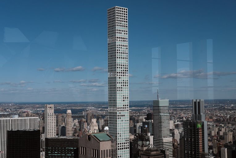 NEW YORK, NEW YORK - MARCH 04: The private residence 432 Park Avenue towers above office buildings ...
