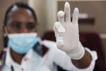 A vile containing Pfizer vaccine to be administered is seen ahead of the launch of the VaxuMzansi Na...