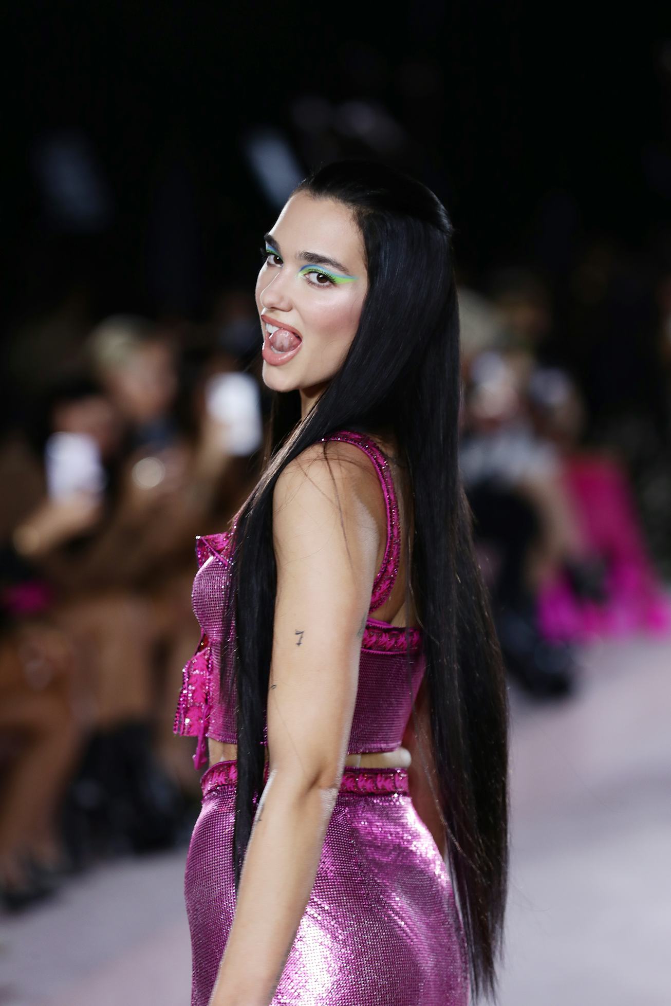 MILAN, ITALY - SEPTEMBER 24: Dua Lipa walks the runway at the Versace fashion show during the Milan ...
