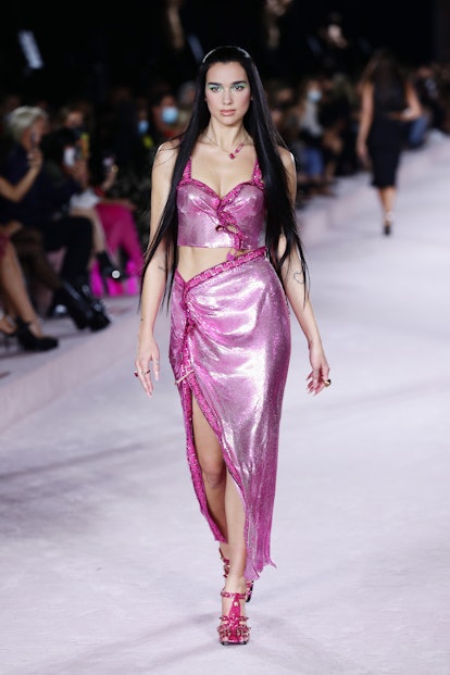 MILAN, ITALY - SEPTEMBER 24: Dua Lipa walks the runway at the Versace fashion show during the Milan ...