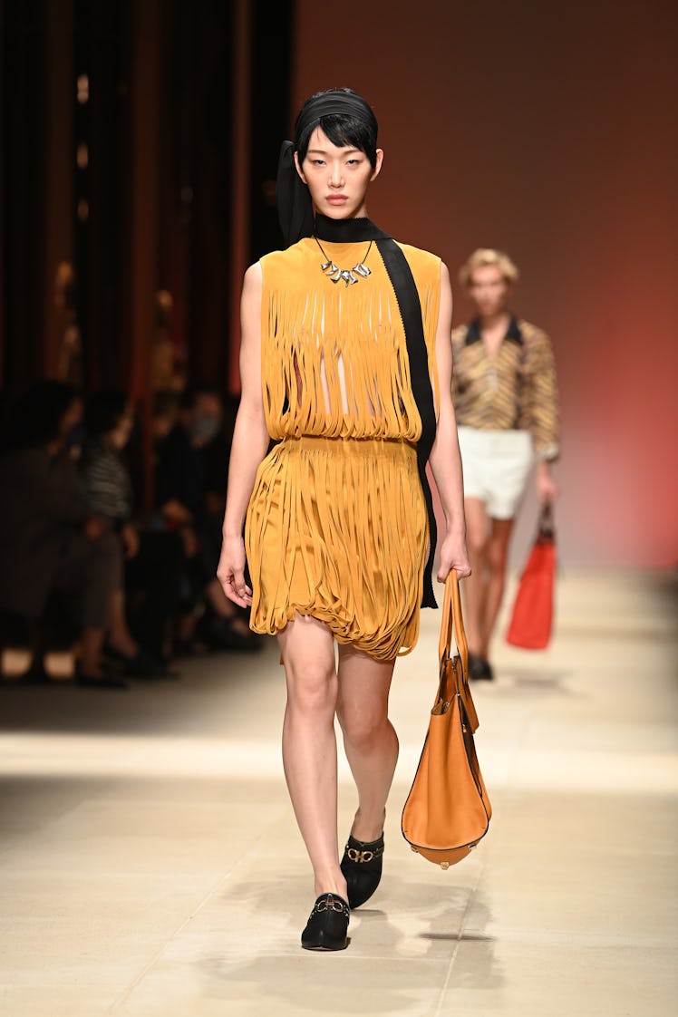 A model walking the runway at the Salvatore Ferragamo show during Milan Fashion Week Spring 2022 in ...