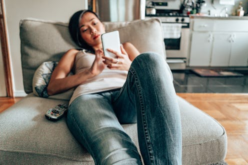A woman tries to delete TikTok on her phone. Here's how to delete your TikTok account.