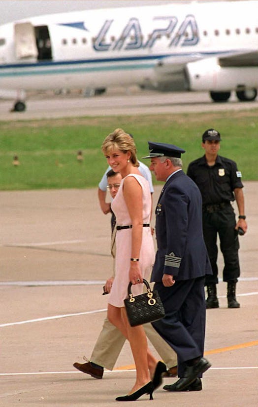 The Princess of Wales, Lady Diana, looks at journalists 26 November as she departs by helicopter for...